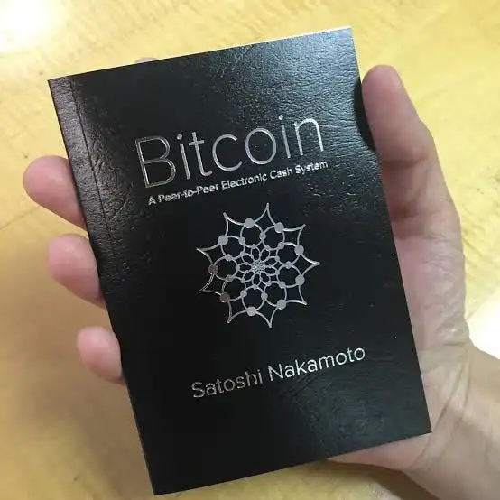 The Book 'Bitcoin: A peer to peer electronic cash system' written by Satoshi Nakamoto